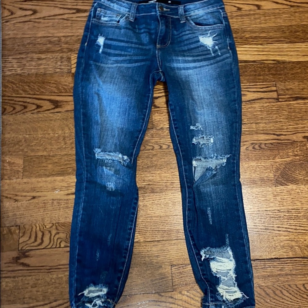 blue ripped jeans